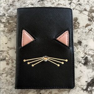 Kate Spade Jazz Cat Passport Cover with Pink Ear Accents and Gold Whisker